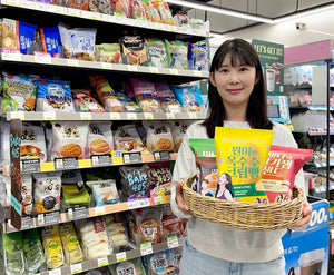 RESCENE bread at CU: a basket of BAKE405 RESCENE breads held up in front of a convenience store bread shelf