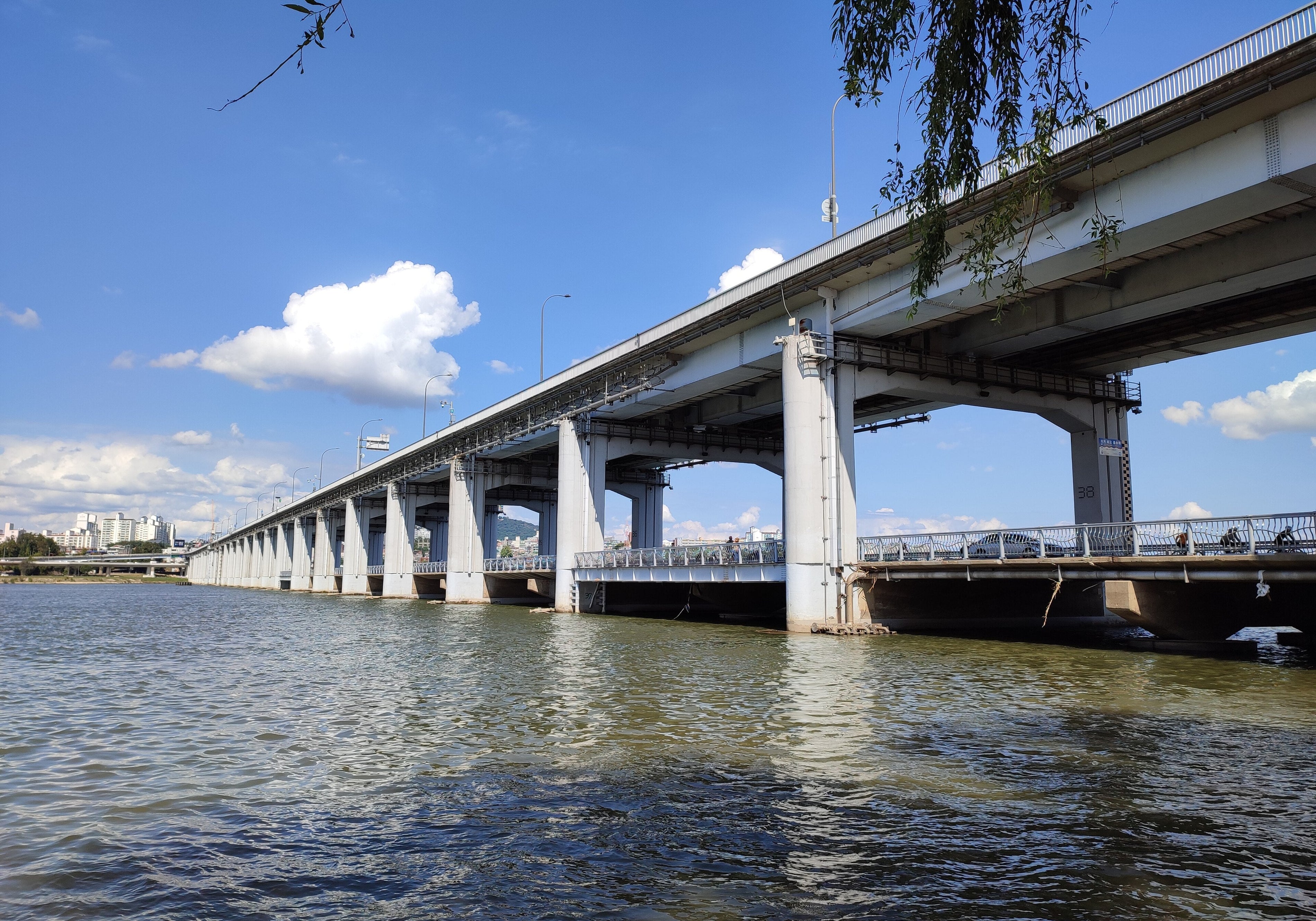 Banpo Bridge and the low Jamsu Bridge over the Han River in Seoul on a clear autumn day, a favorite running crossing