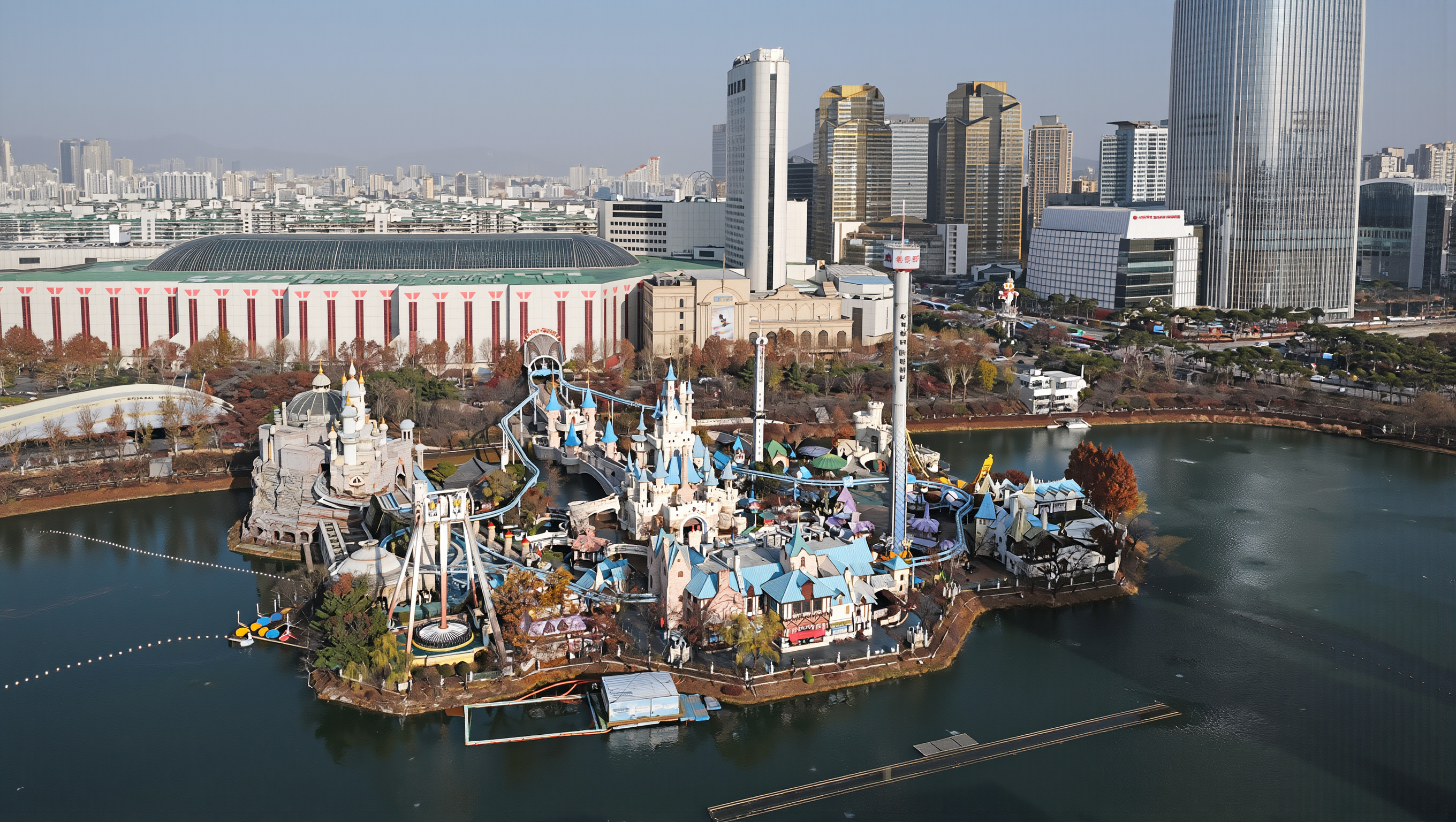Lotte World Halloween season in Seoul: Magic Island's castle rides on Seokchon Lake under clear autumn light