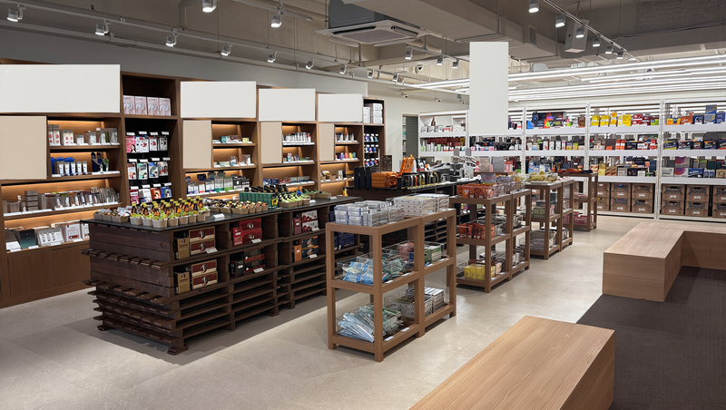 Pharmacy in Korea: a bright, modern pharmacy interior in Seoul with warm wooden shelving and tidy aisles