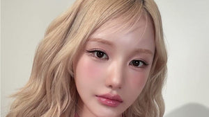 K-pop idol makeup finished look: glossy pink lips, rosy blush and soft blonde waves (ARTstage1992 Official YouTube)