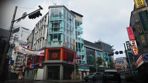 Silkworm map in Modern Warfare 4, a daytime Korean shopping street lined with hangul signboards (Call of Duty Official Blog)
