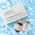 Dr. Elreju box and two vials on water