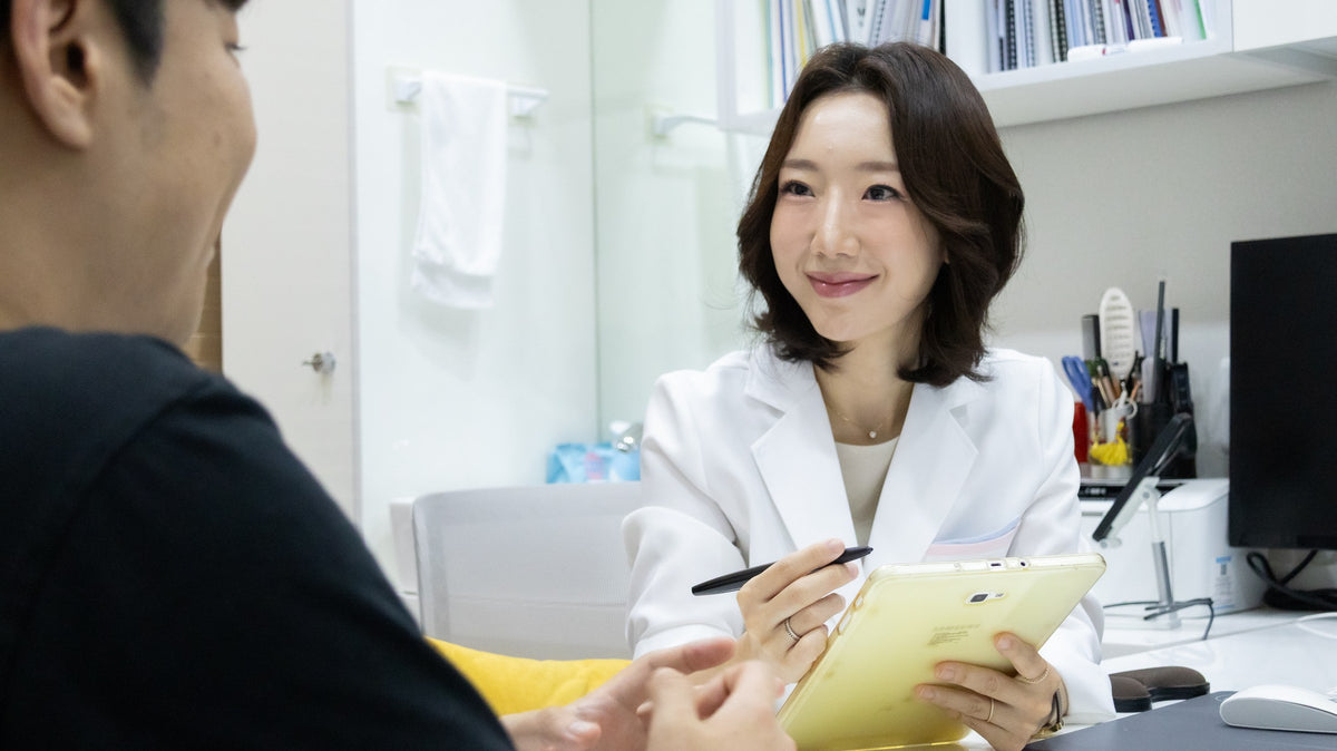 Dr. Wonjin Cho in a consultation at CHAI Clinic, Hapjeong, Seoul